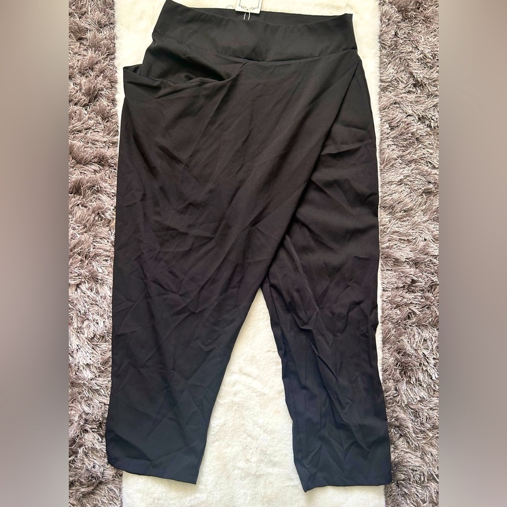Black crossover slacks